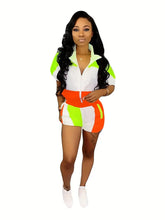 Image & Stylez LLCSuperFly Tracksuit Shorts SetSuperFly Tracksuit Shorts SetThis Sporty and Fun Tracksuit 2-piece Shorts Set is definitely on trend. The material is lightweight and breathable. The top features a shirt collar and zipper with shorts Set